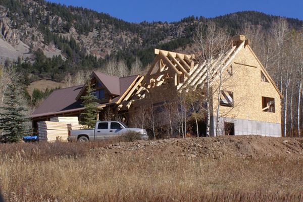 Structural Insulated Panels for a Hybrid Log Home Roof